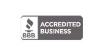 Gray and white logo with the text "BBB Accredited Business" and a torch symbol, representing accreditation by the Better Business Bureau.